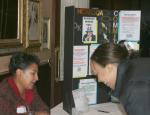 Gail Gibson at the registration desk